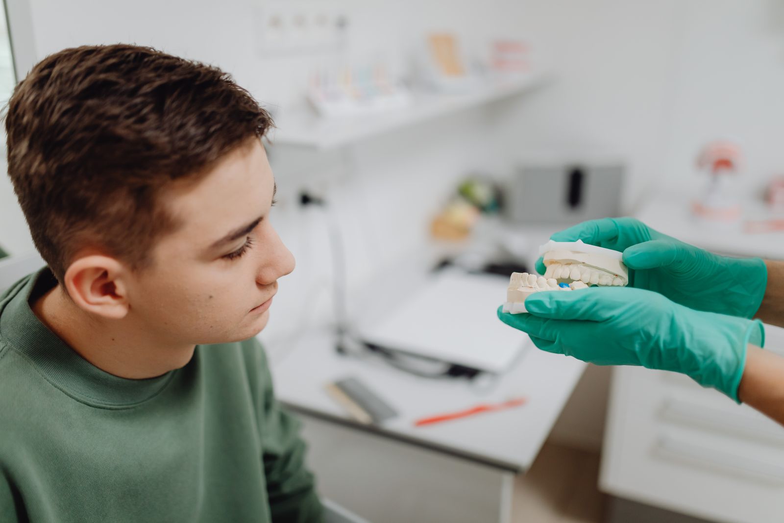 Patient speaking with a dentist during an appointment